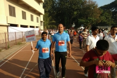 Om Logistics's team runs in Pune Marathon
