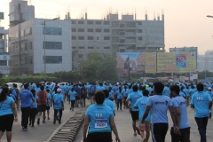 Om Logistics's team runs in Pune Marathon